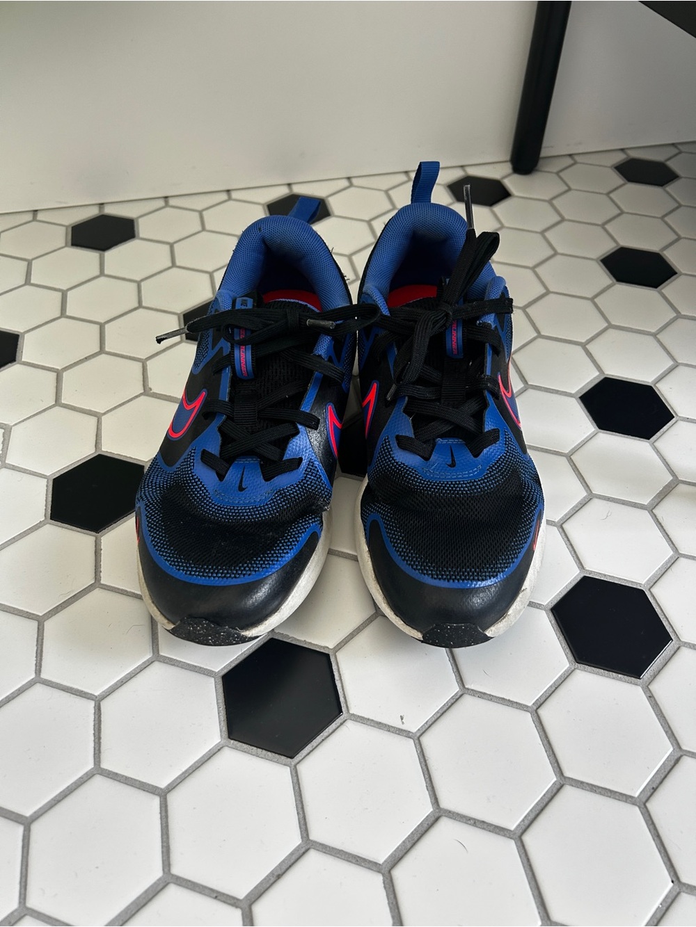 Nike Kids' Black and Blue Sneakers with Pink Swoosh